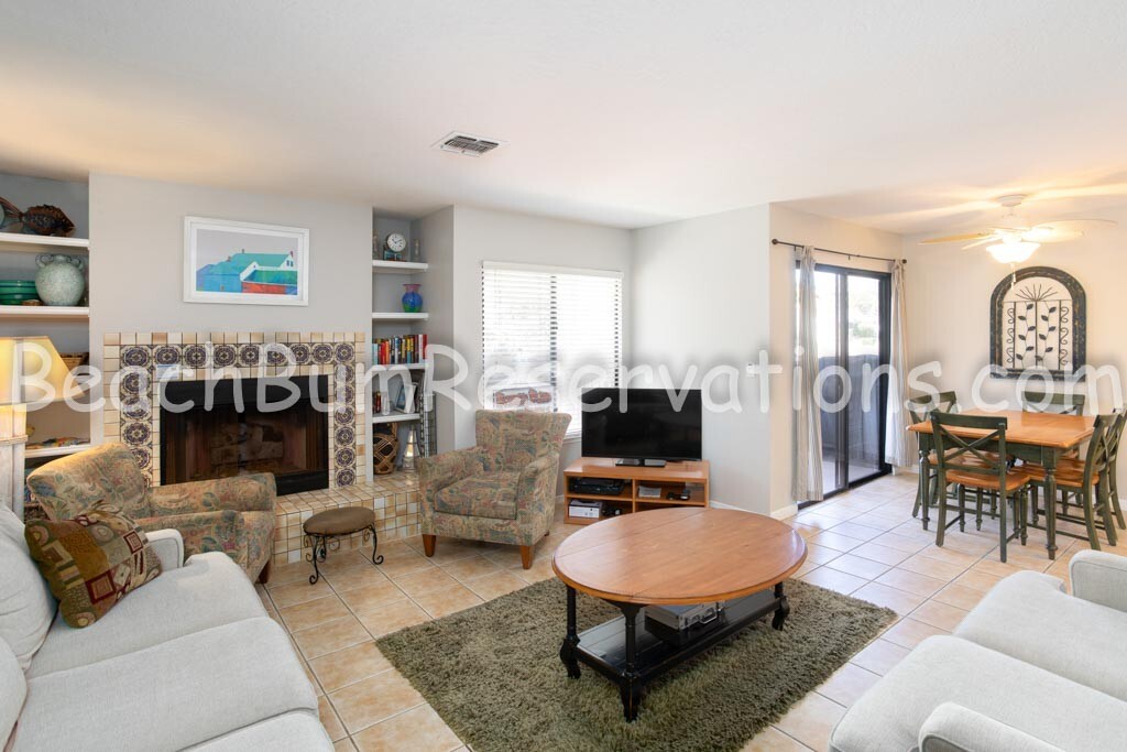 Interior shot of living room and dining room table.